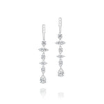 The Mixed Shape Diamond Ear Jacket in White Gold features a sleek bar top with small fastening holes and a vertical row of sparkling, mixed shape diamonds ending in a teardrop stone.