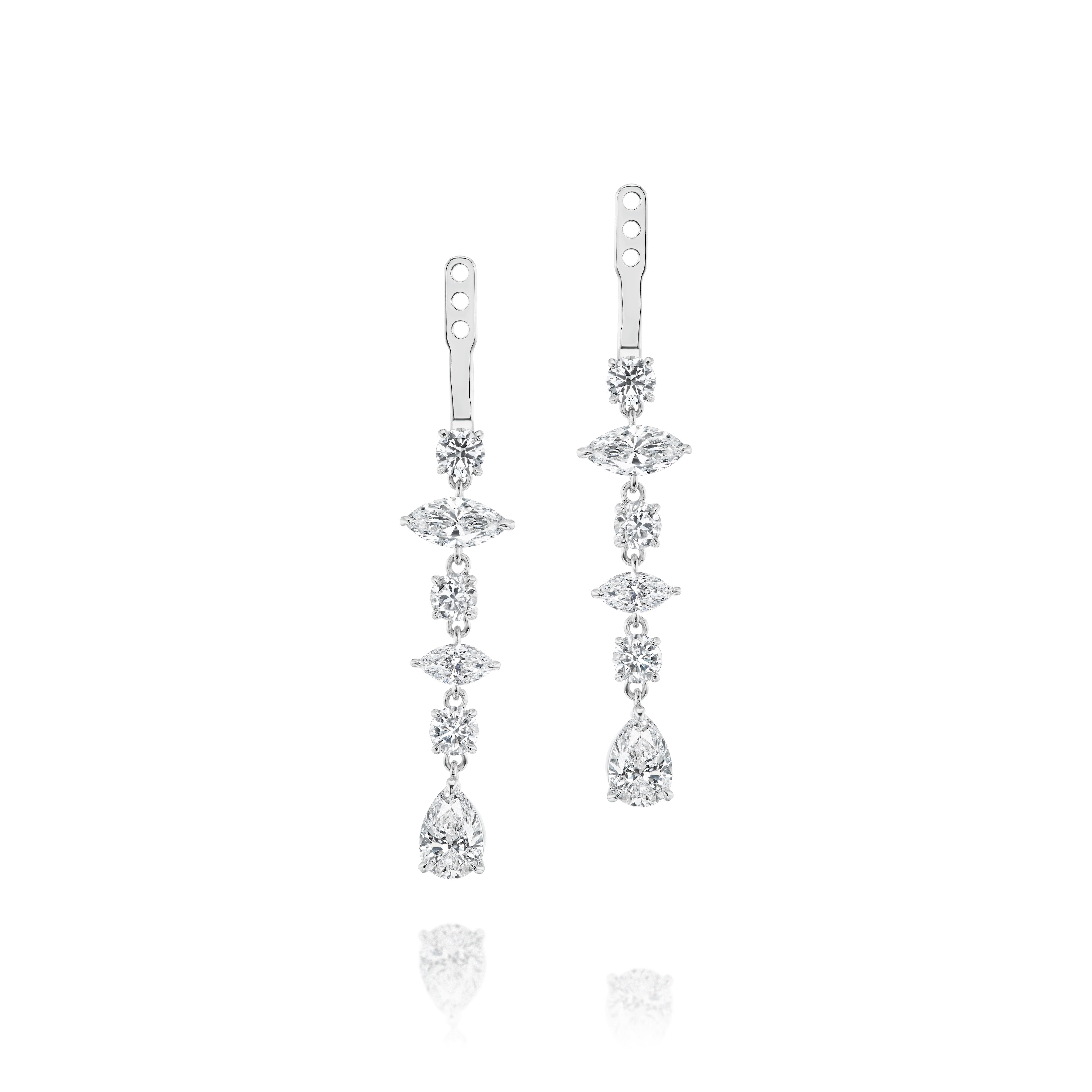 The Bespoke Mixed Shape Diamond Ear Jacket in White Gold features round, marquise, and pear-shaped diamonds in a linear drop design, elegantly displayed on a white background.