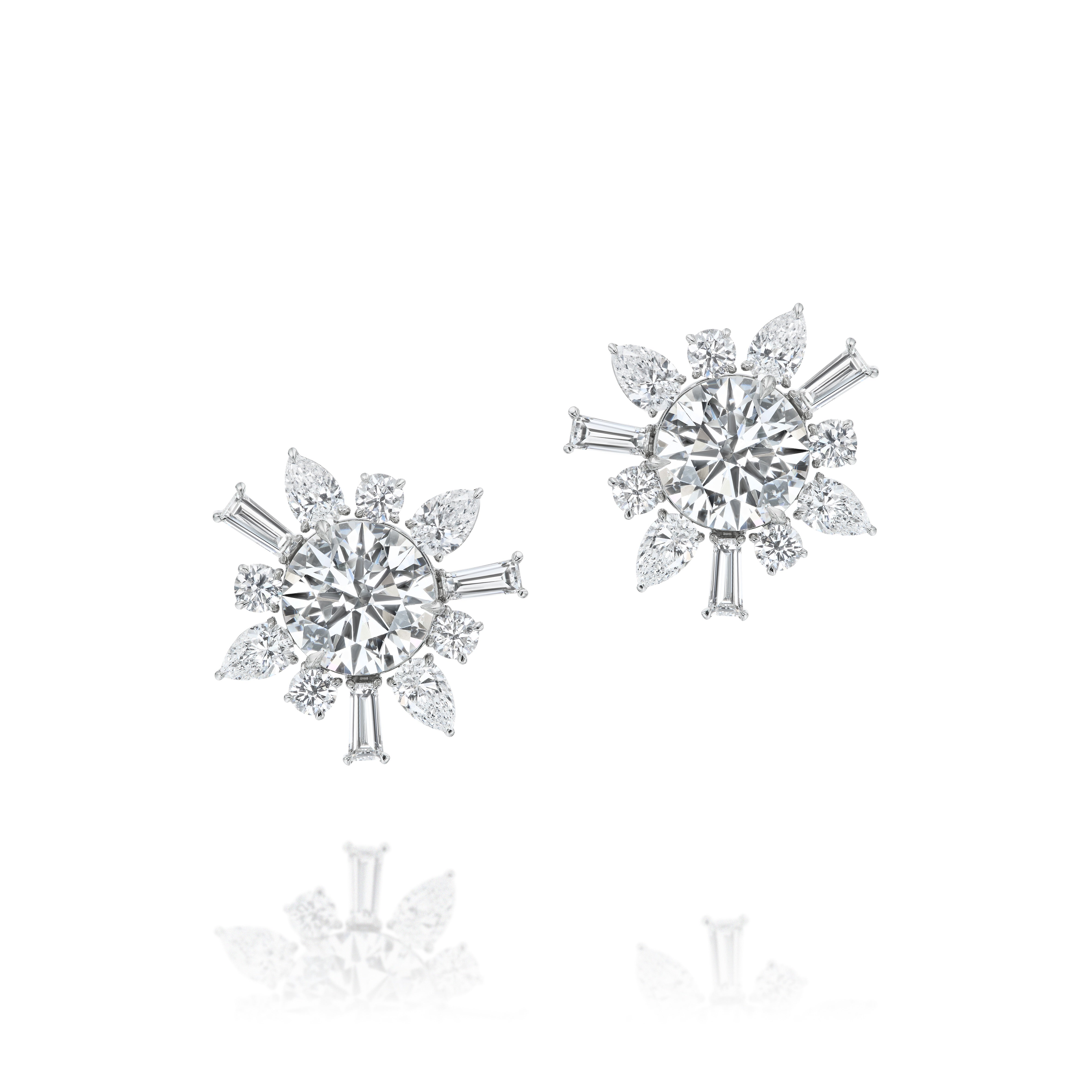 The Bespoke Mixed Shape Diamond Ear Jacket in White Gold showcases luxury starburst earrings with round, baguette, and marquise diamonds set in an elegant ear jacket design.