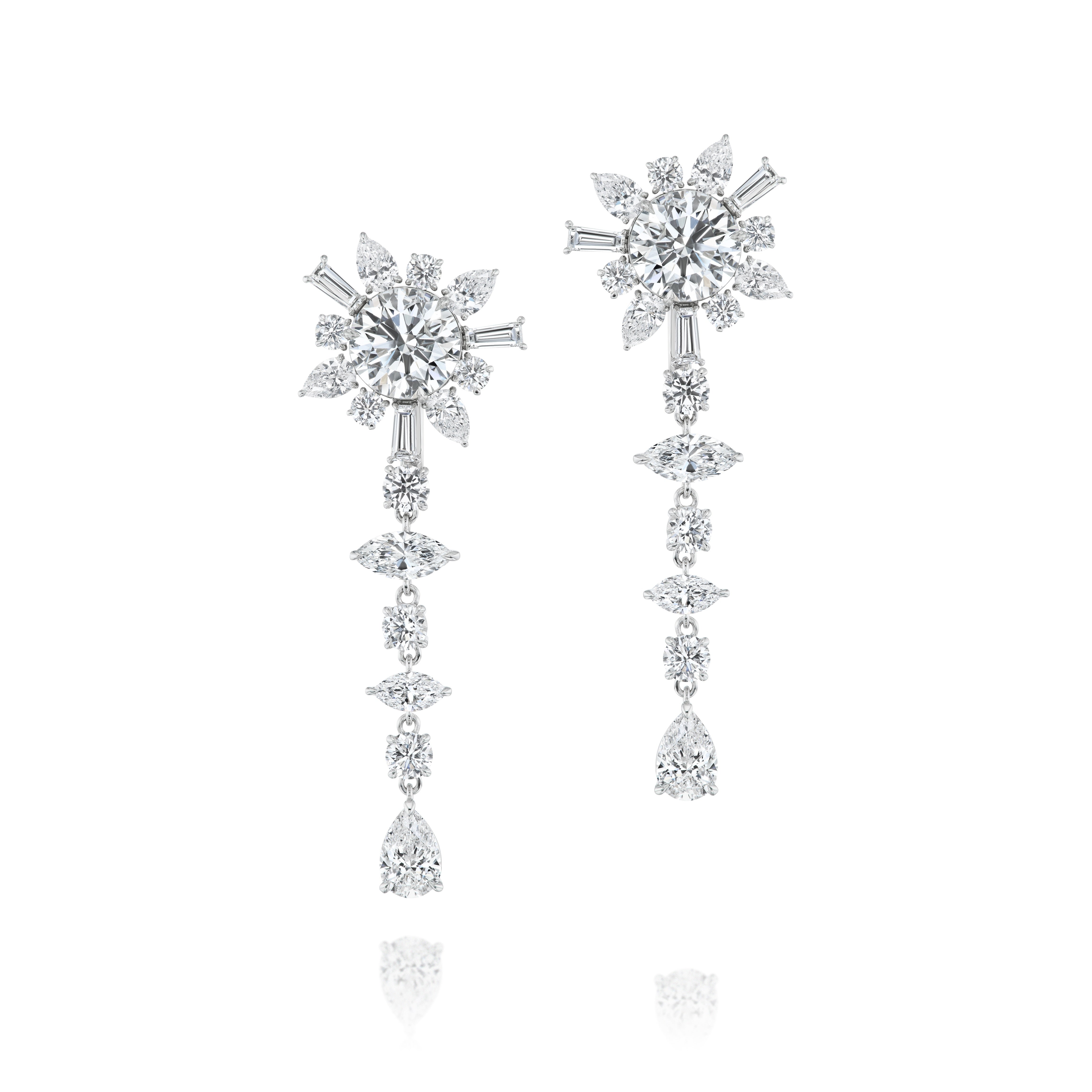 The Bespoke Mixed Shape Diamond Ear Jacket in White Gold features an elegant floral cluster with mixed shape diamonds, followed by a vertical row of varied-shaped diamonds for a luxurious look.