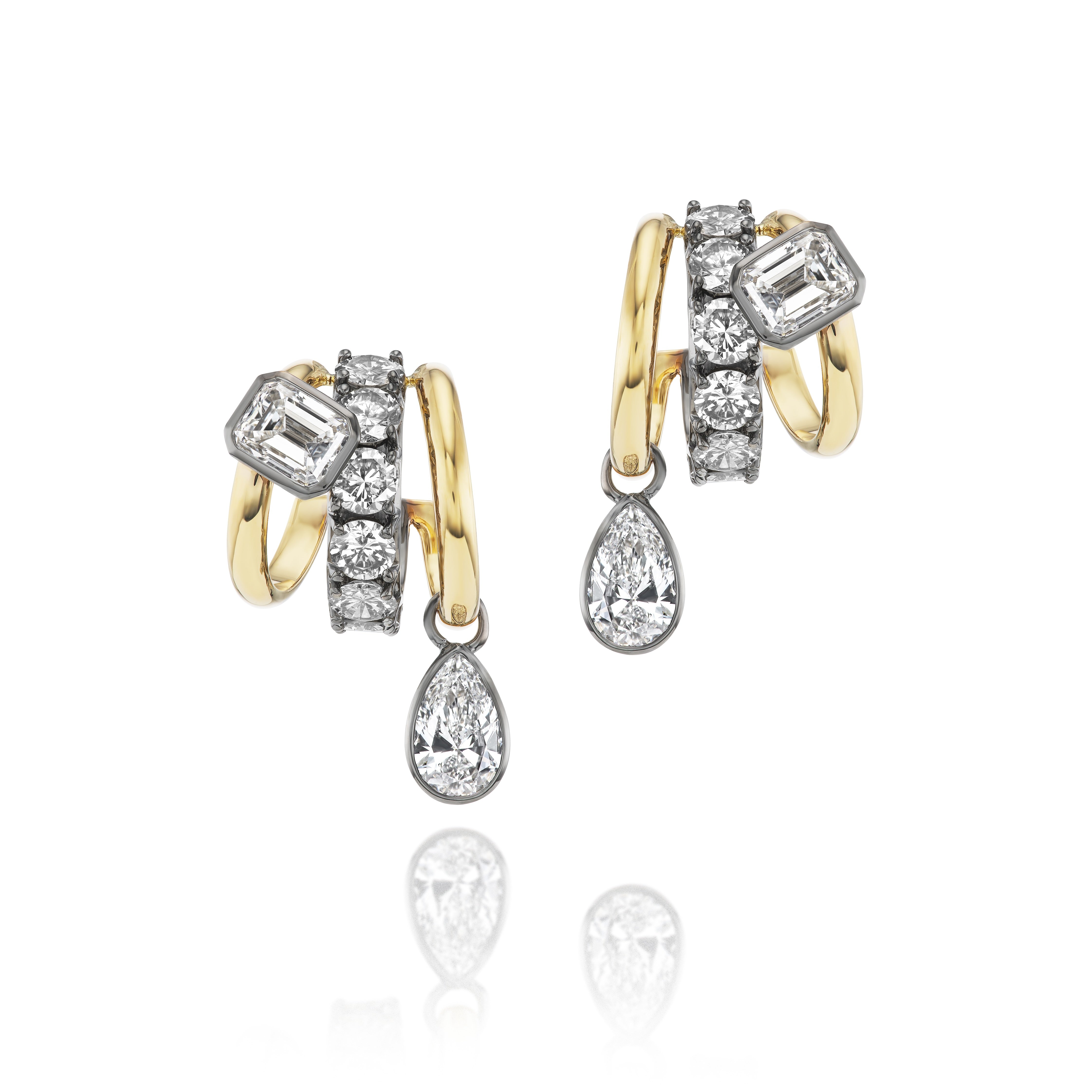Huggie Earrings in Yellow Gold and Black Plated Yellow Gold, featuring round, emerald cut, and pear shape diamonds, displayed on a white background.