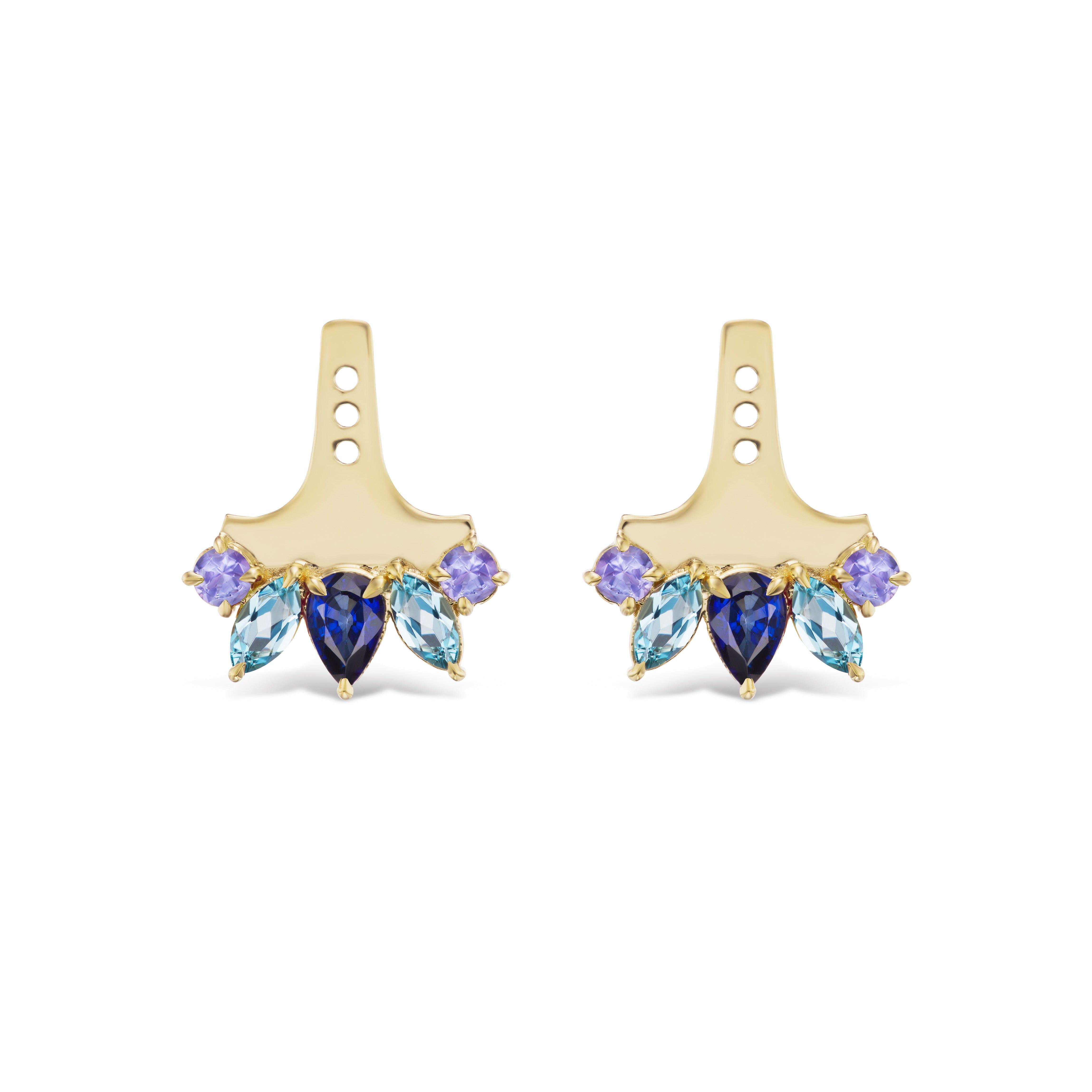 The Multicolor Mixed Shape Sapphire Ear Jackets are 18k yellow gold earrings with three top holes and a fan-shaped design, showcasing blue and purple sapphires plus aqua marquise gemstones arranged symmetrically at the bottom.