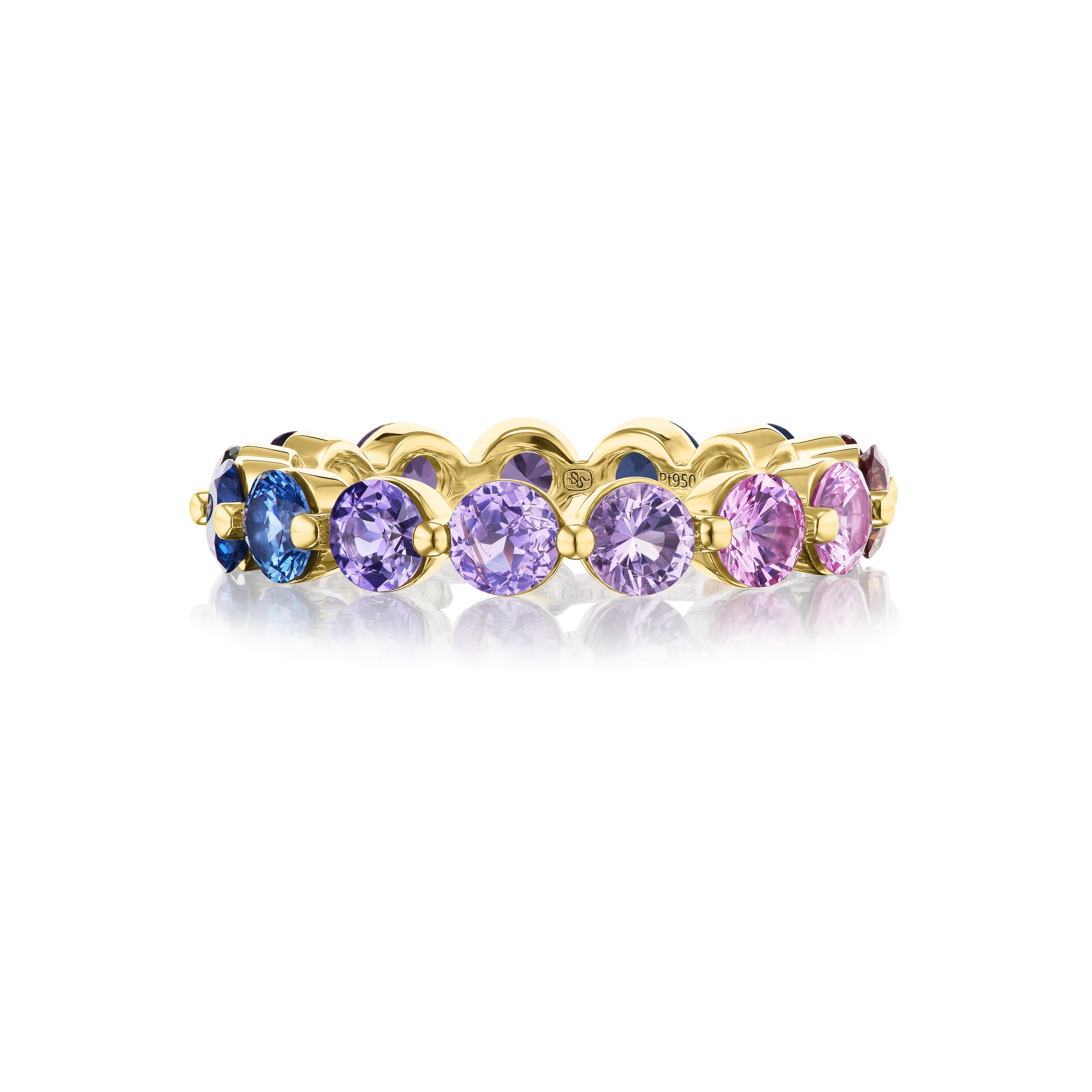 The Multicolor Round Sapphire Eternity Band in Yellow Gold features a row of blue and pink sapphires in gradient hues, set in 18K yellow gold against a white background.