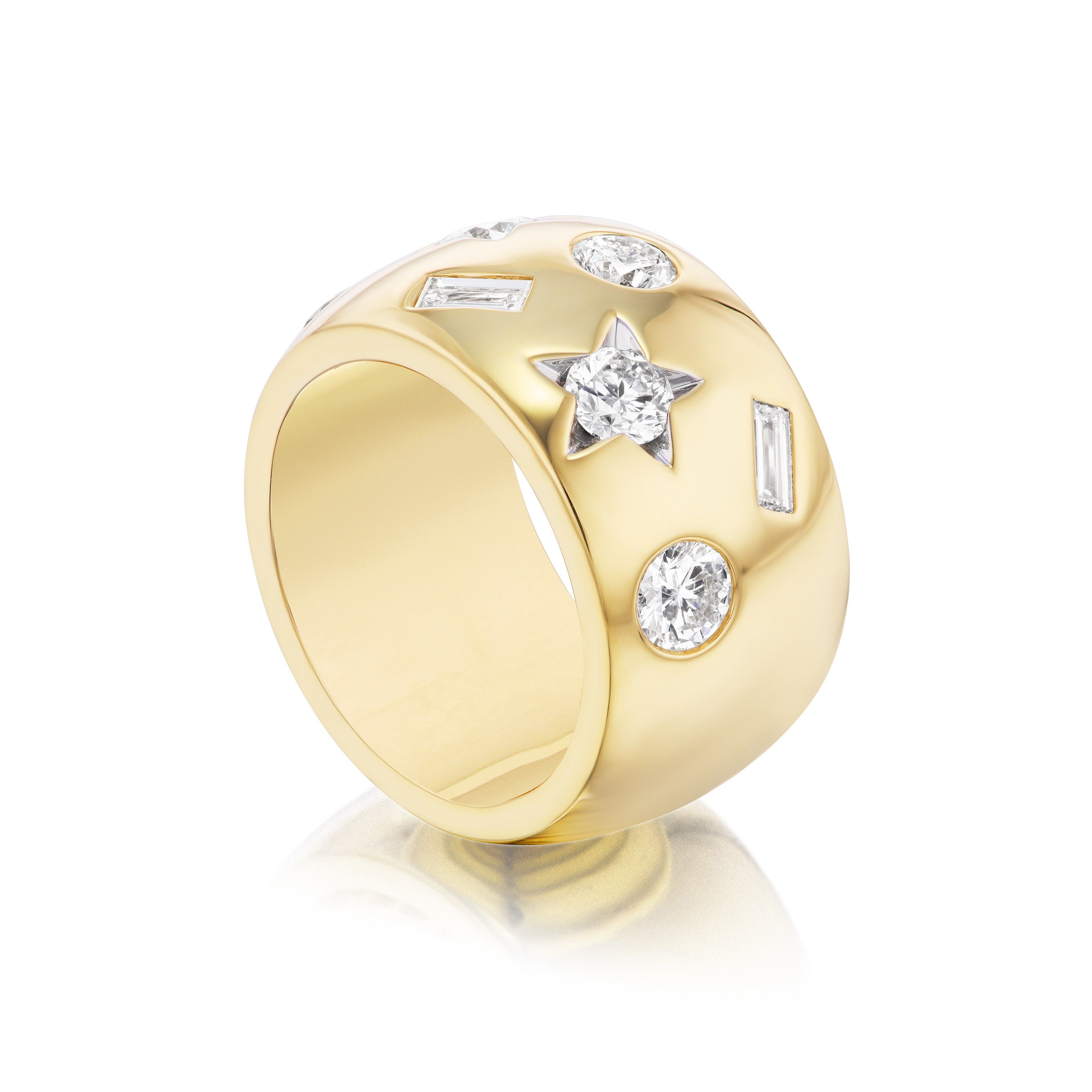 The Large Celestial Cigar Band in Yellow Gold with Mixed Shape Diamonds features star, round, and baguette diamonds set in a wide 18k gold band, part of the Celestial Collection.