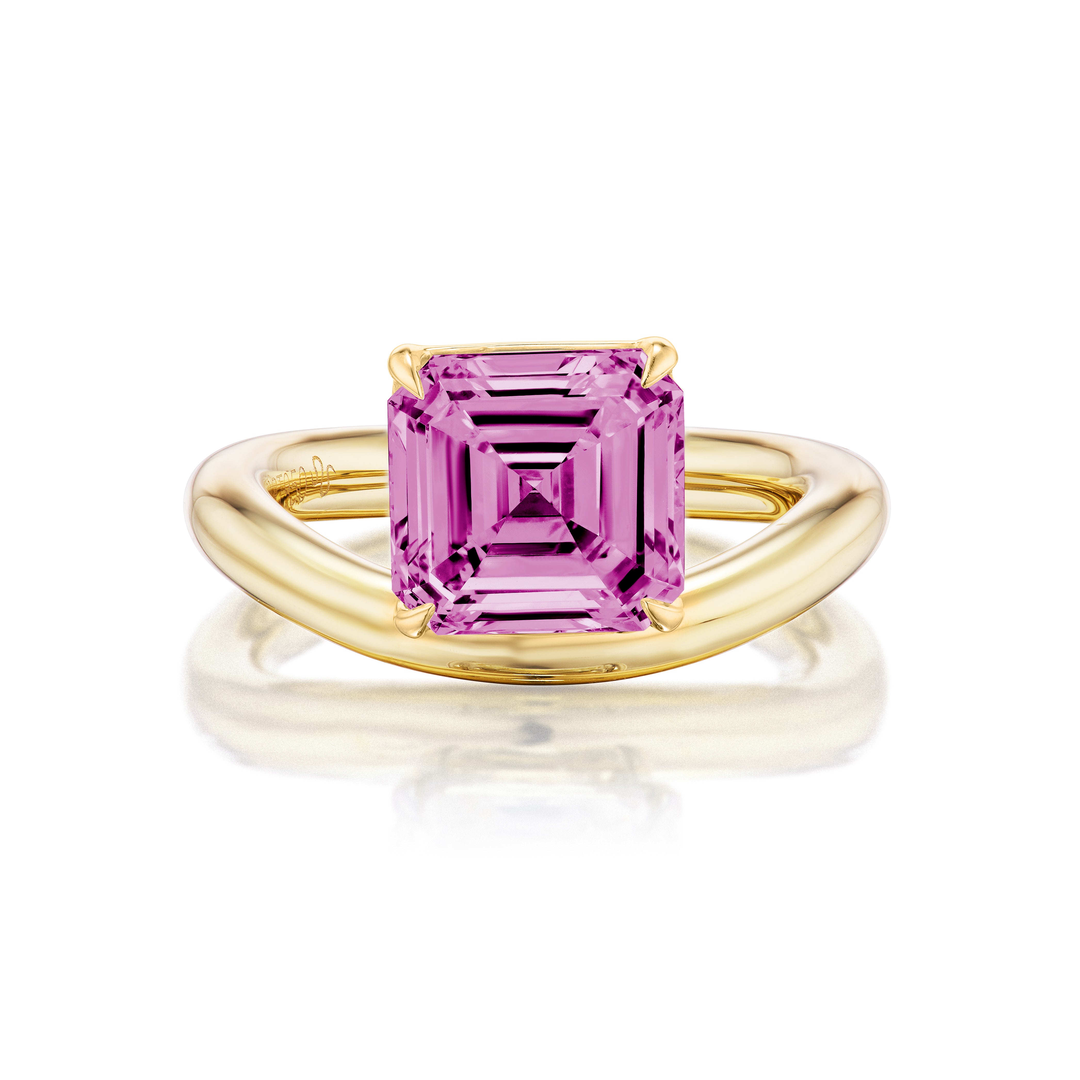 The Pinky Ring in Yellow Gold features an Asscher cut pink sapphire set in 18K yellow gold, shown against a white background.
