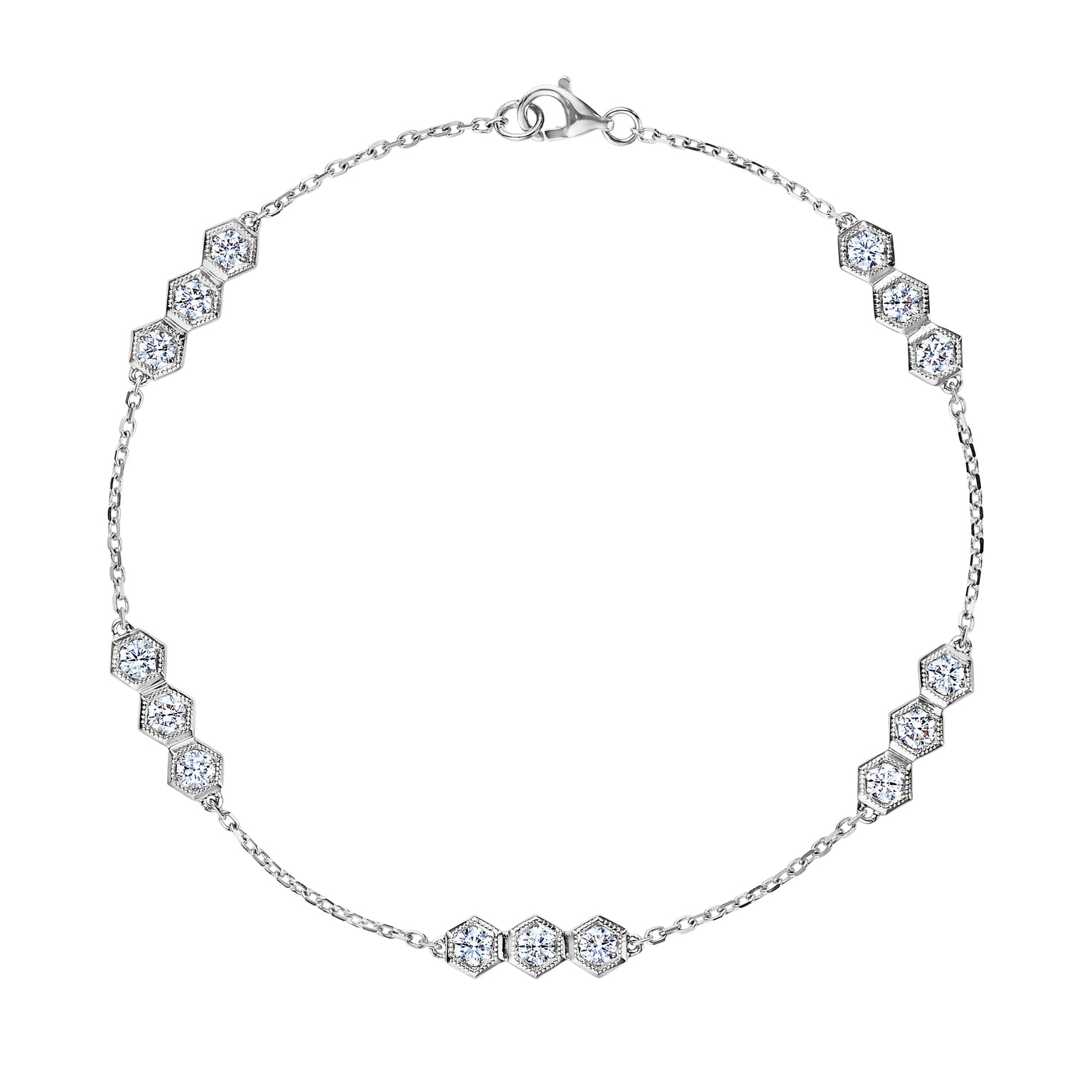 The Serpentine Station Bracelet with Hexagon Diamond Trios features small hexagonal stations with sparkling round diamonds, spaced along a fine silver chain and finished with a lobster clasp.