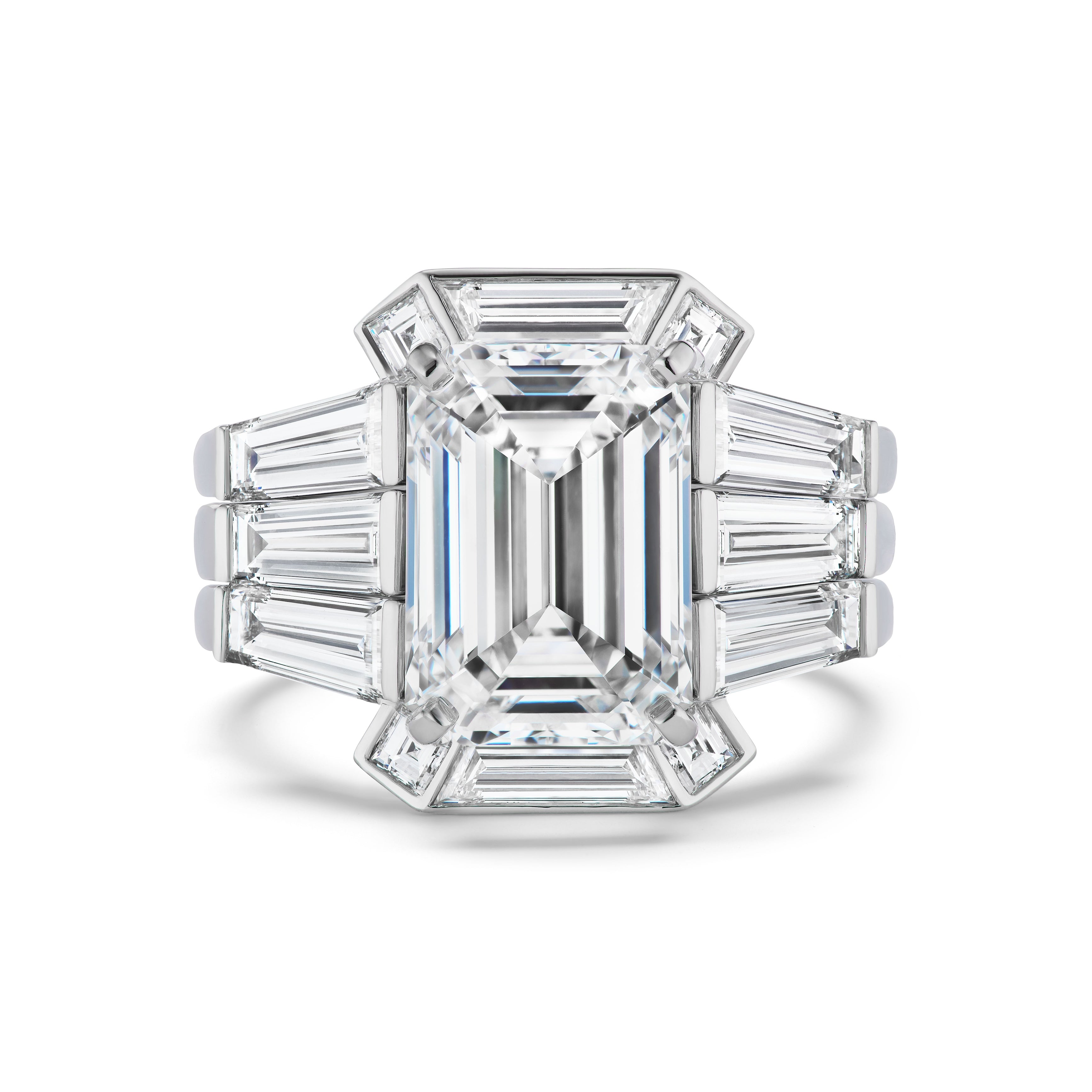 The Bespoke Geometric Bezel Set Baguette and Asscher Cut Diamond Ring Jacket in white gold features a striking arrangement of baguette and Asscher-cut diamonds, creating a bold, art deco-inspired geometric look.