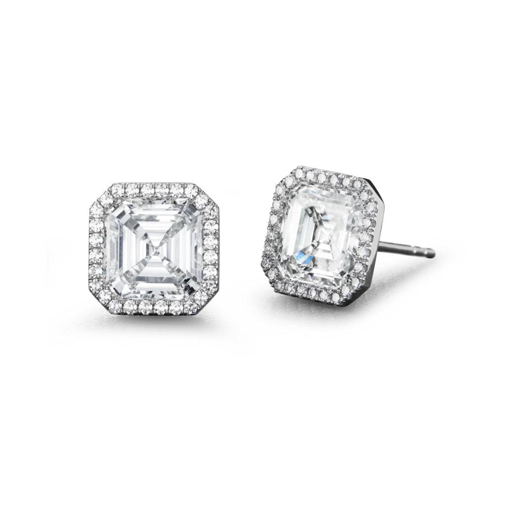 Pavé Studs in White Gold with Asscher Cut Diamonds feature square-cut diamonds accented by pavé-set round stones in 18K white gold, shown against a white background.