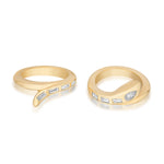 The Serpent Bookend Rings in Yellow Gold with Mixed Shape Diamonds feature two modern 18k bands adorned with baguette and marquise-cut diamonds, showcasing sleek curves and contemporary snake-inspired designs.