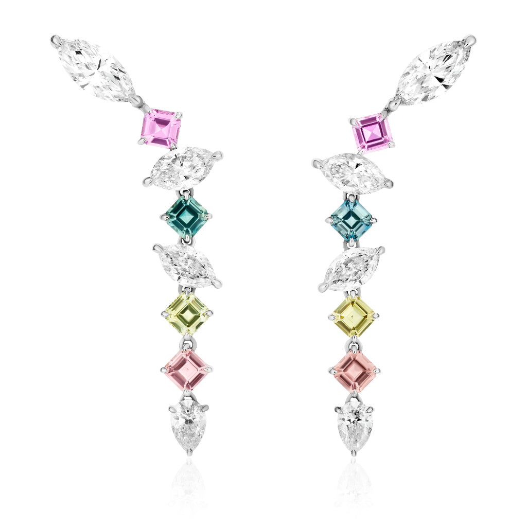 The Waterfall Earrings in White Gold feature mixed shape diamonds and sapphires in pink, green, yellow, and blue, set vertically for an elegant drop style.