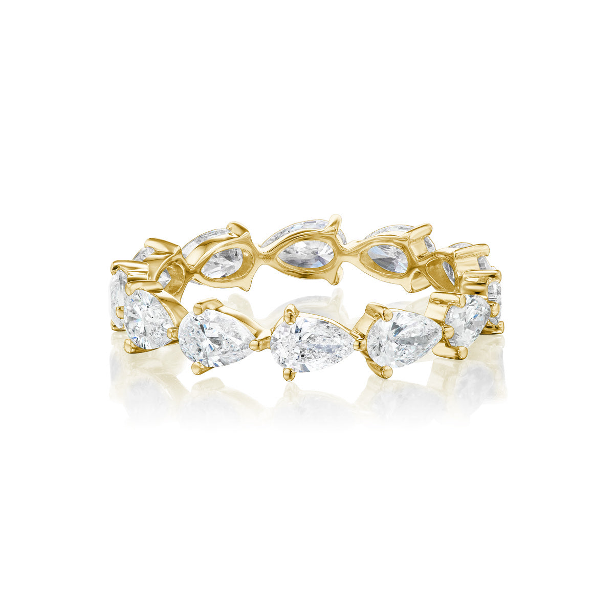 The Chasing Pears Eternity Band features alternating pear-shaped diamonds and marquise-cut gemstones set in 18K gold, forming an elegant continuous pattern. Shown beautifully on a white background.