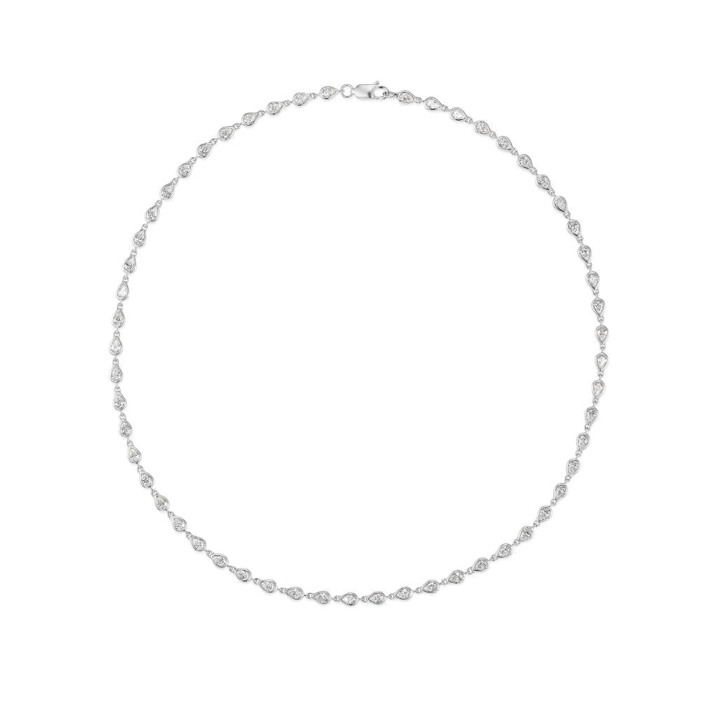 The Chasing Pears Garland Necklace showcases a continuous chain of pear-shaped sparkling diamonds set in 18K white metal, elegantly arranged in a circle against a white background.