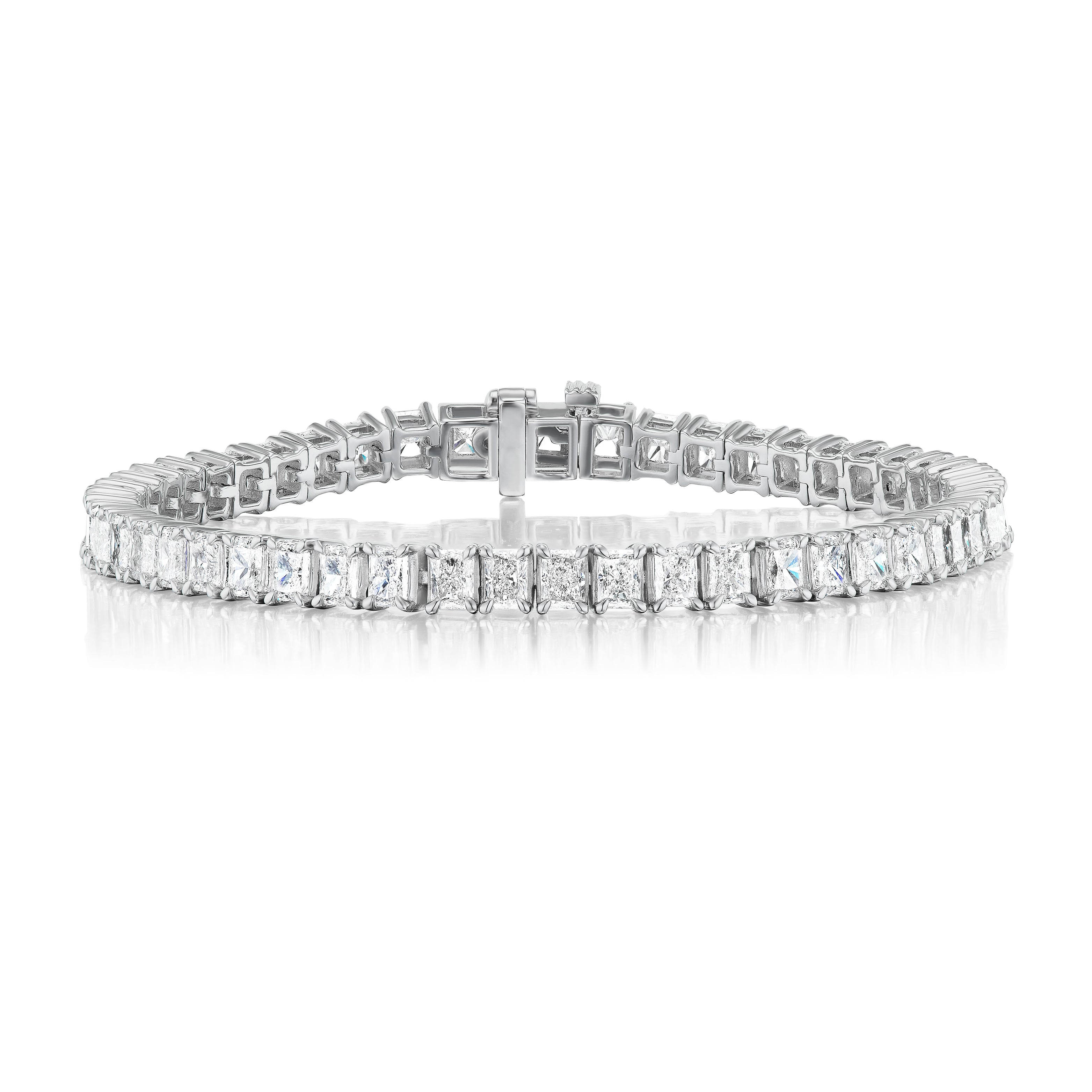 The Radiant Cut Diamond Tennis Bracelet features a row of radiant cut diamonds set in a straight line with a secure clasp, showcased on a white background.