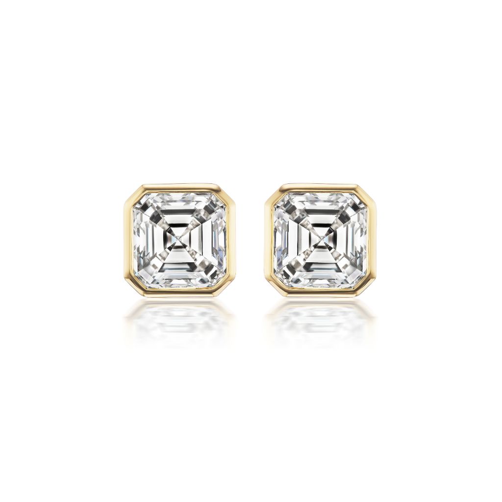 Asscher Cut Studs: Square-shaped diamond studs with asscher cut, set in 18k yellow gold and shown on a white background.