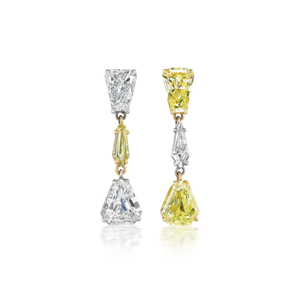 The This & That Champagne Flute Drop Earrings feature three mixed-shape diamonds each—one earring with all white stones, the other with a fancy yellow diamond framed by two whites, set in 18K yellow gold and white metal.