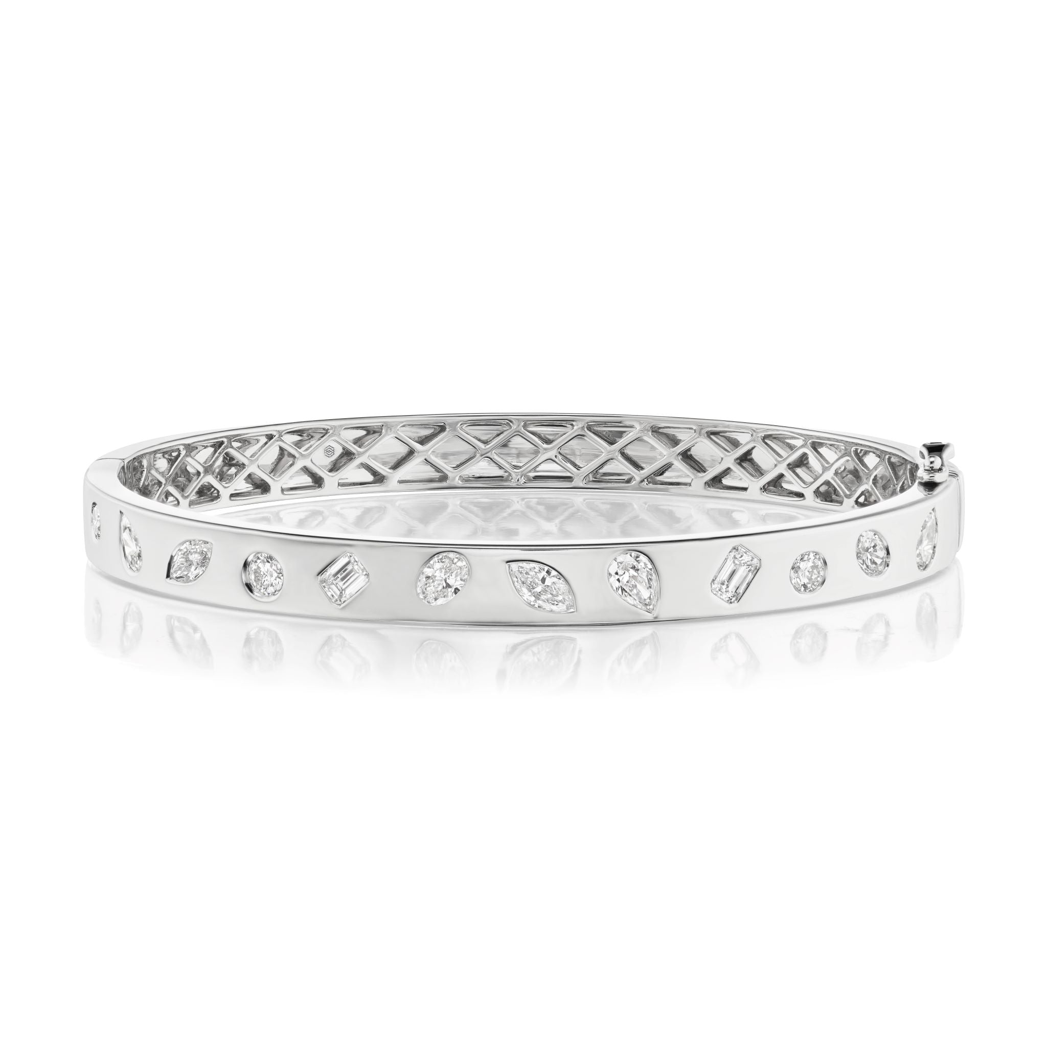 The Burnish Set Mixed Shape Diamond Bangle features a polished silver surface adorned with various diamond shapes, displayed on a white background with a soft reflection.
