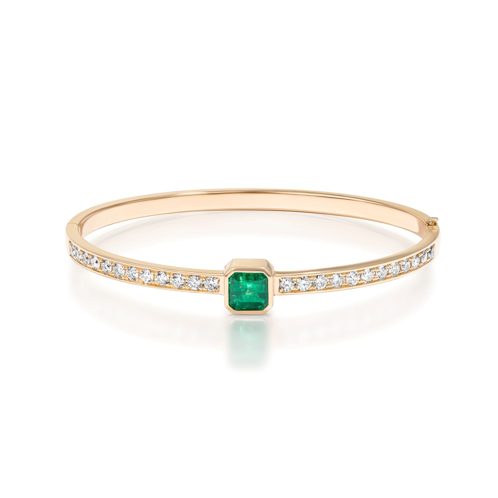 The Asscher Cut Emerald Pavé Diamond Bangle in Yellow Gold showcases a square emerald centerpiece and pavé diamond accents set in 18k yellow gold.