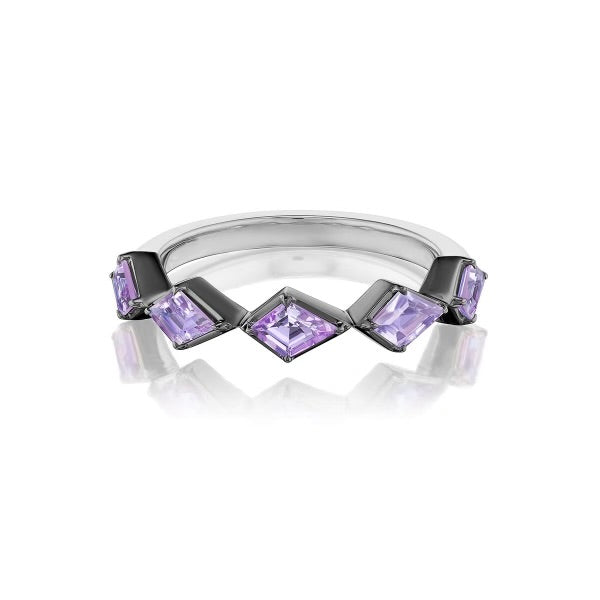 The Chasing Kites Purple Sapphire Half Eternity Band in Rhodium features five angular, diamond-shaped purple sapphires set in a zigzag pattern along the band, displayed on a white background with a subtle reflection.