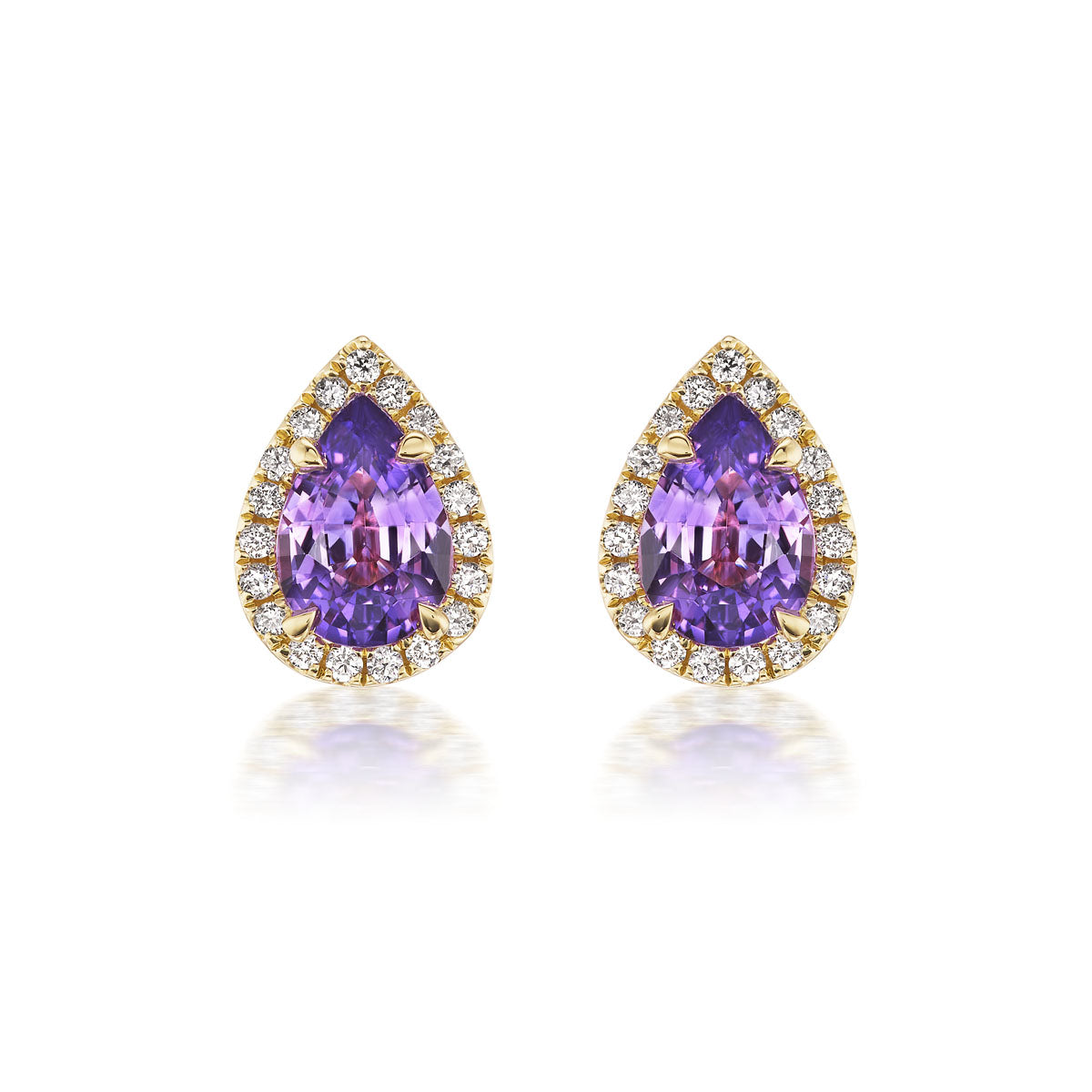 Pear Shape Purple Sapphire Stud Earrings in Yellow Gold feature teardrop sapphires with pavé round diamond side stones for added sparkle.