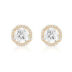The Pavé Octagon Ear Jackets feature round brilliant diamonds in 18k gold octagonal settings, each accented with a halo of pavé-set diamonds for enhanced sparkle.