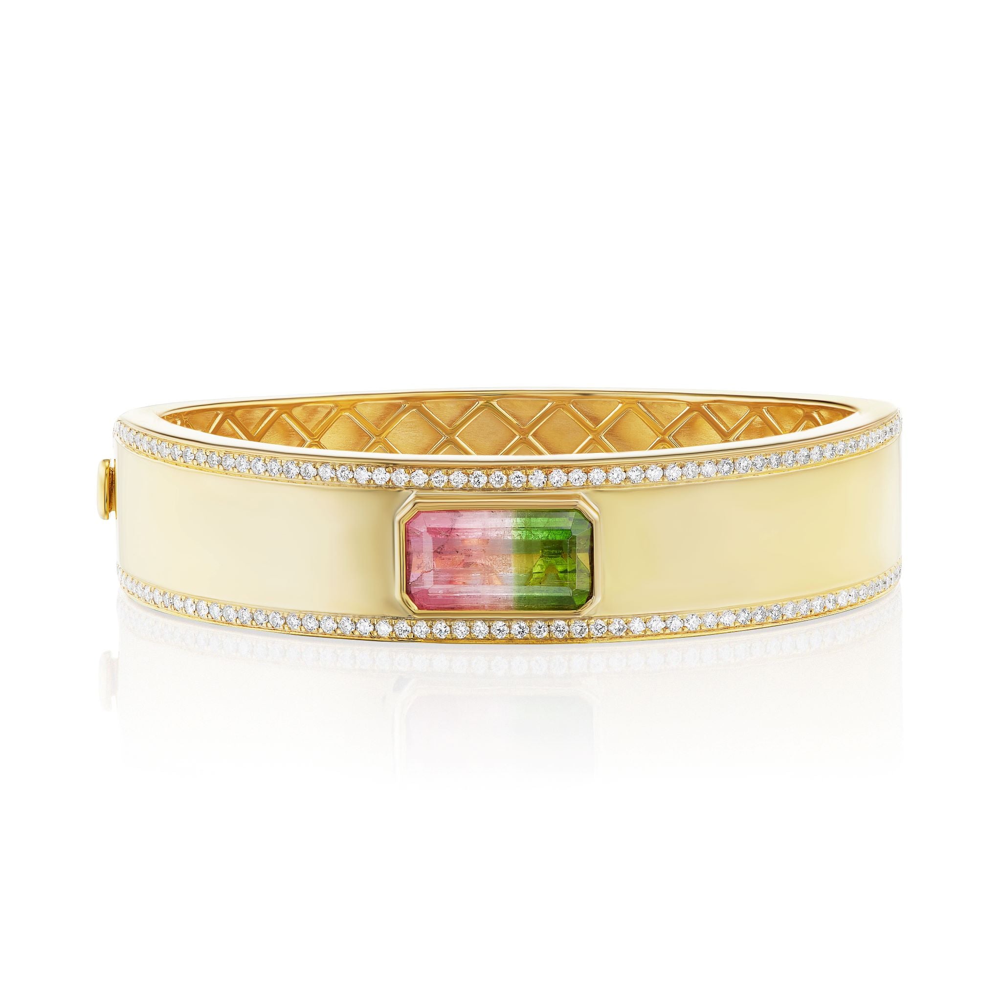 The East-West Set Tourmaline Bangle with Pavé Trim in Yellow Gold showcases a cream enamel band bordered by pavé diamonds and is centered with an emerald-cut watermelon tourmaline.